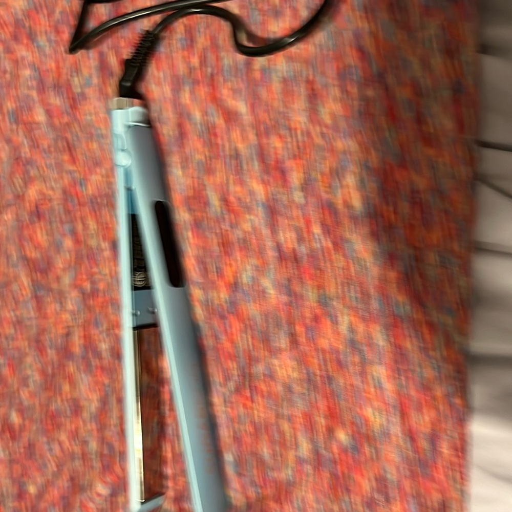 Sugar baby blue hair straightener.